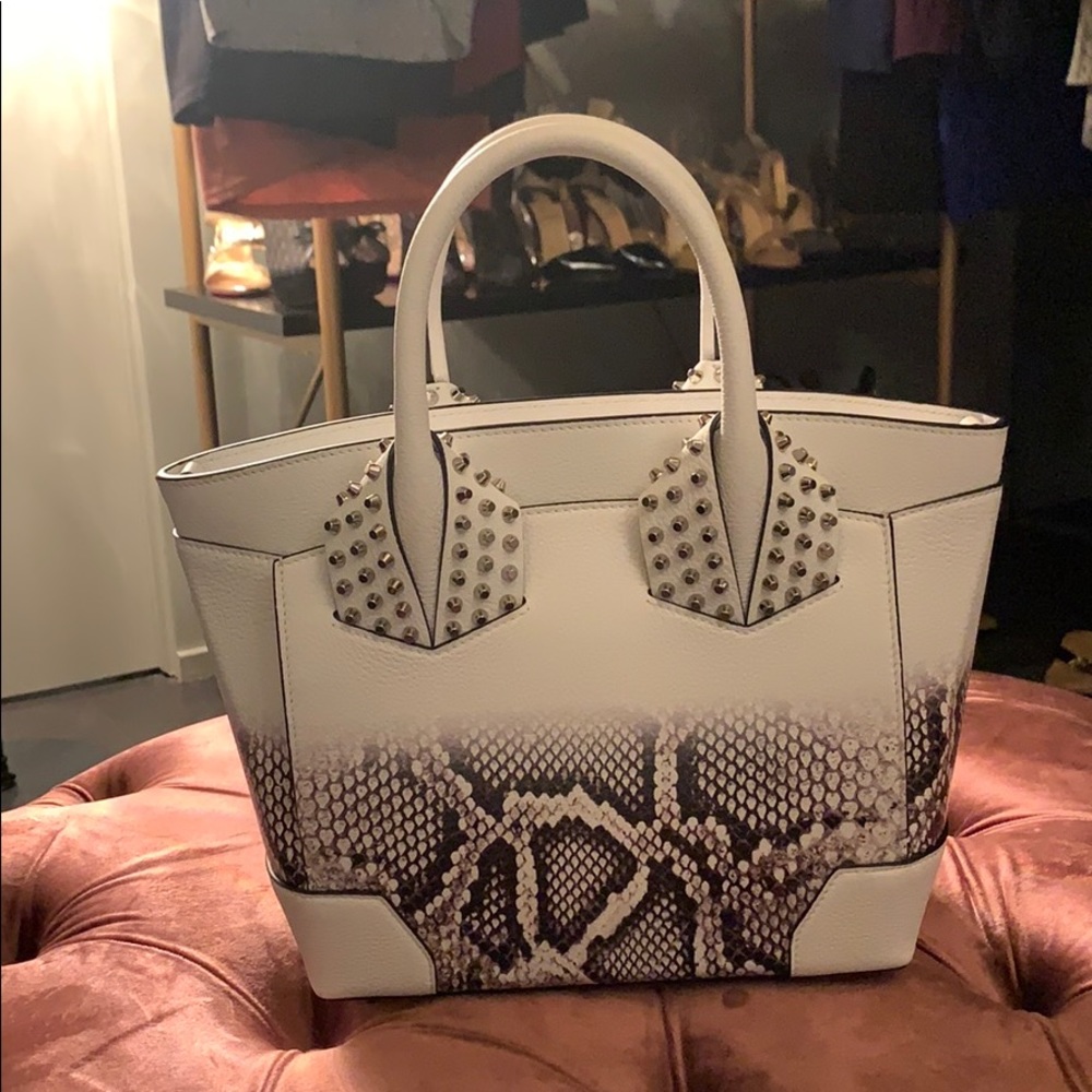 Christian louboutin white and snake print handbag